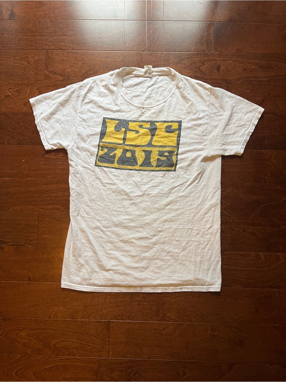 Vintage style Fruit of the Loom White Short Sleeve Tee with Yellow Graphic